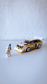 yellow and black car scale model