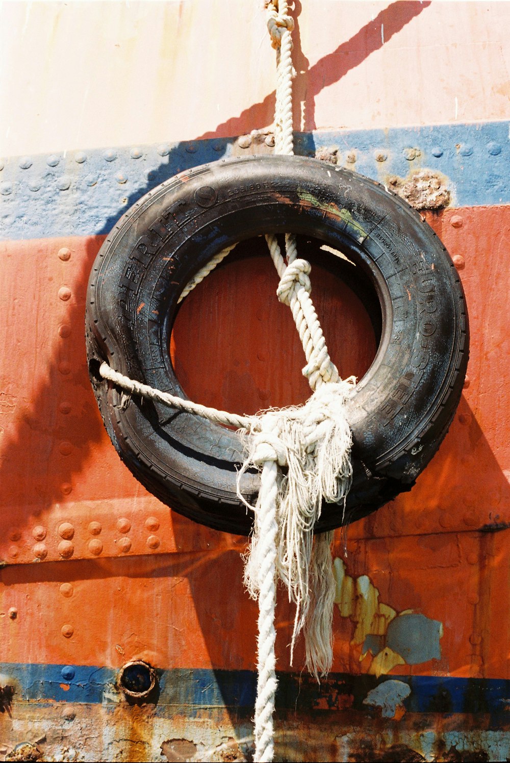 black and white rope on black round tire