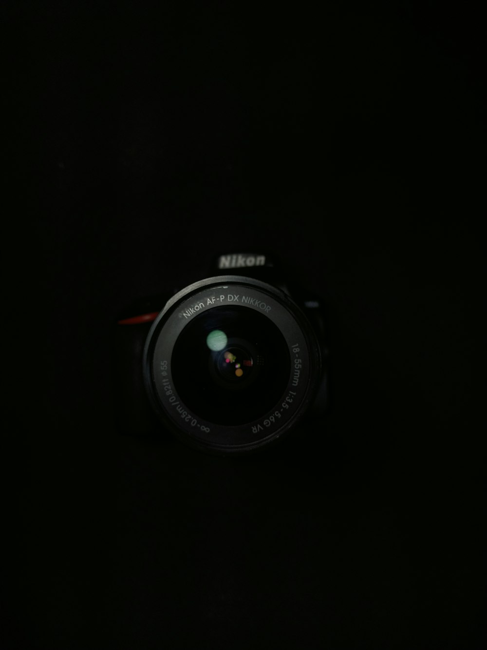 black nikon dslr camera lens