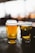 clear drinking glass with beer on black table