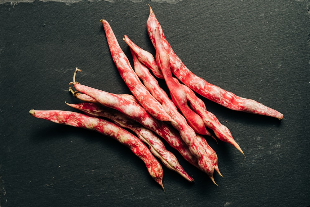 red chili on black surface