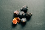 black and brown round fruits