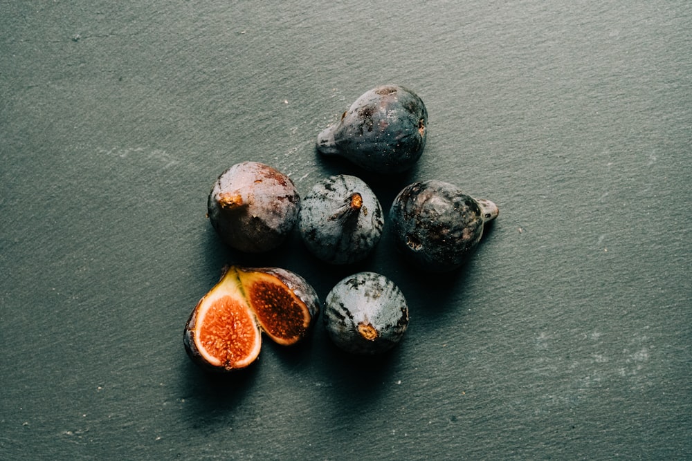 black and brown round fruits