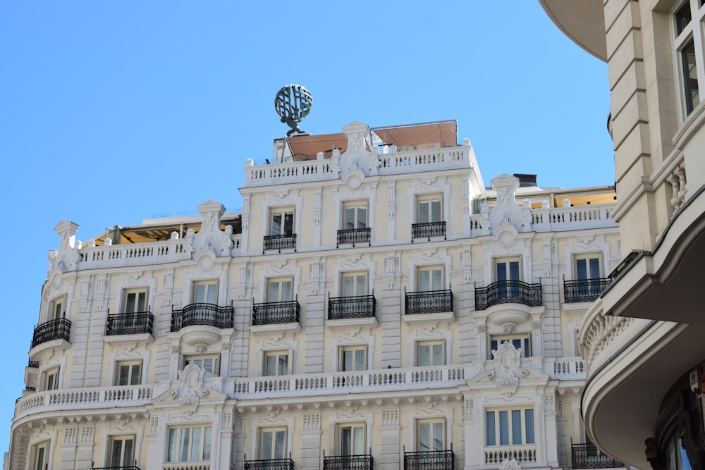 white concrete building under blue sky during daytime