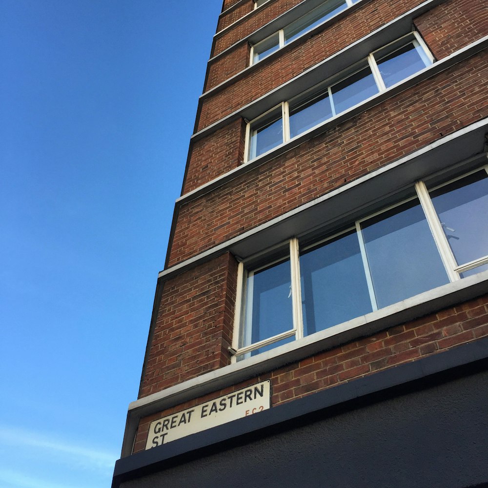 brown concrete building under blue sky during daytime