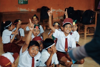 children in white school uniform