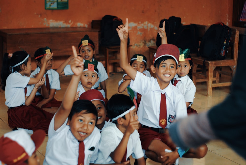 children in white school uniform