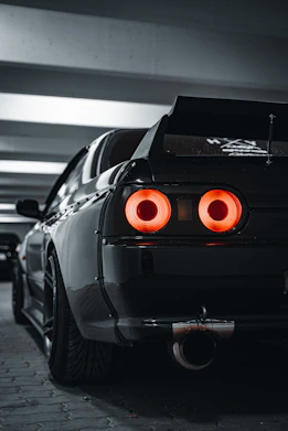 black car in a parking lot