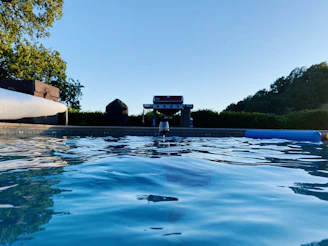 A tranquil view of the pool area from above, showcasing the elegant layout and relaxed atmosphere of Nerida.