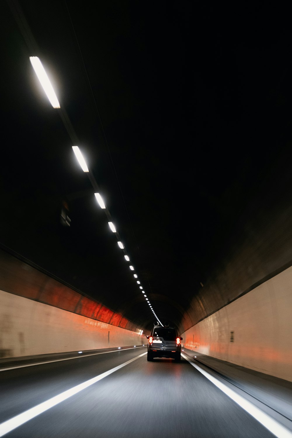 white car on road during nighttime