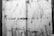 A monochrome image depicts a rough, scratched surface with the words 'YOUR ANGER IS A GIFT' stenciled in bold capital letters. The background appears to be metal with various markings and scratches.