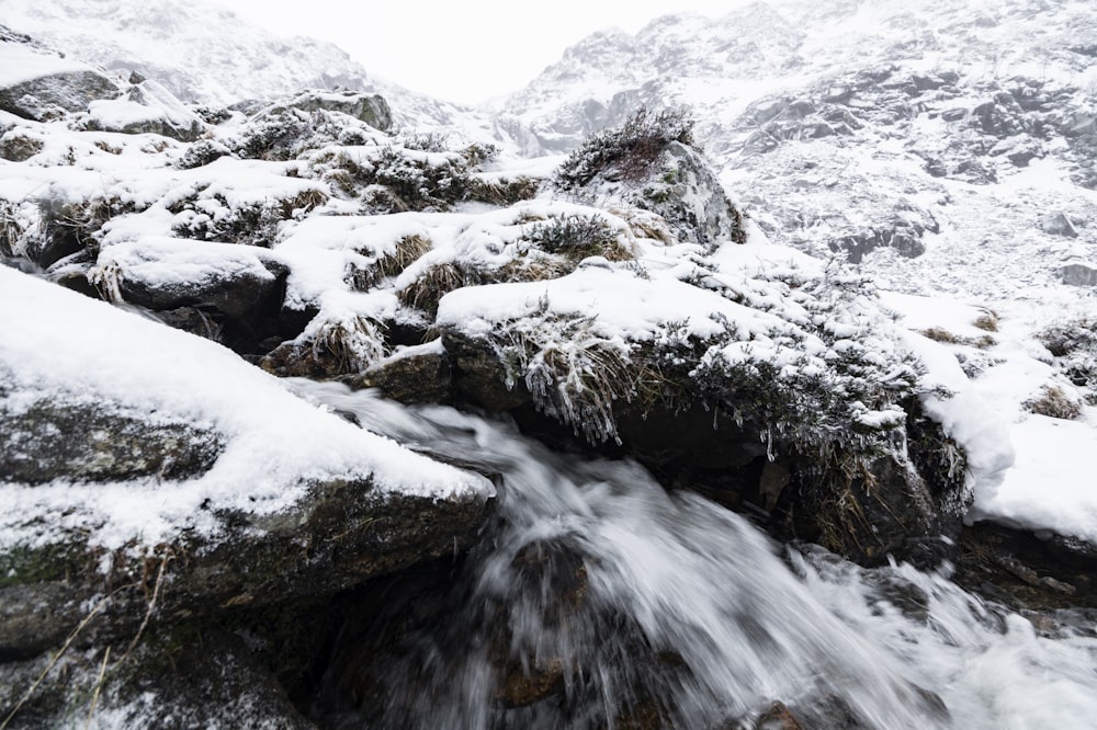 water falls on rocky mountain