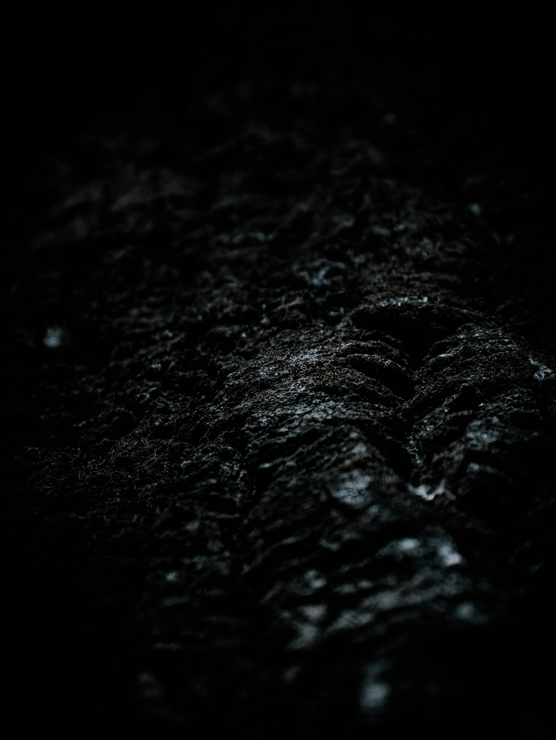 black textile in close up photography