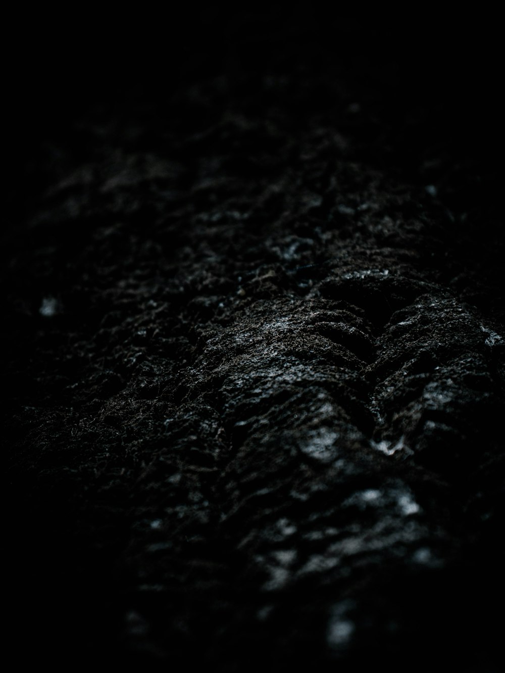 black textile in close up photography