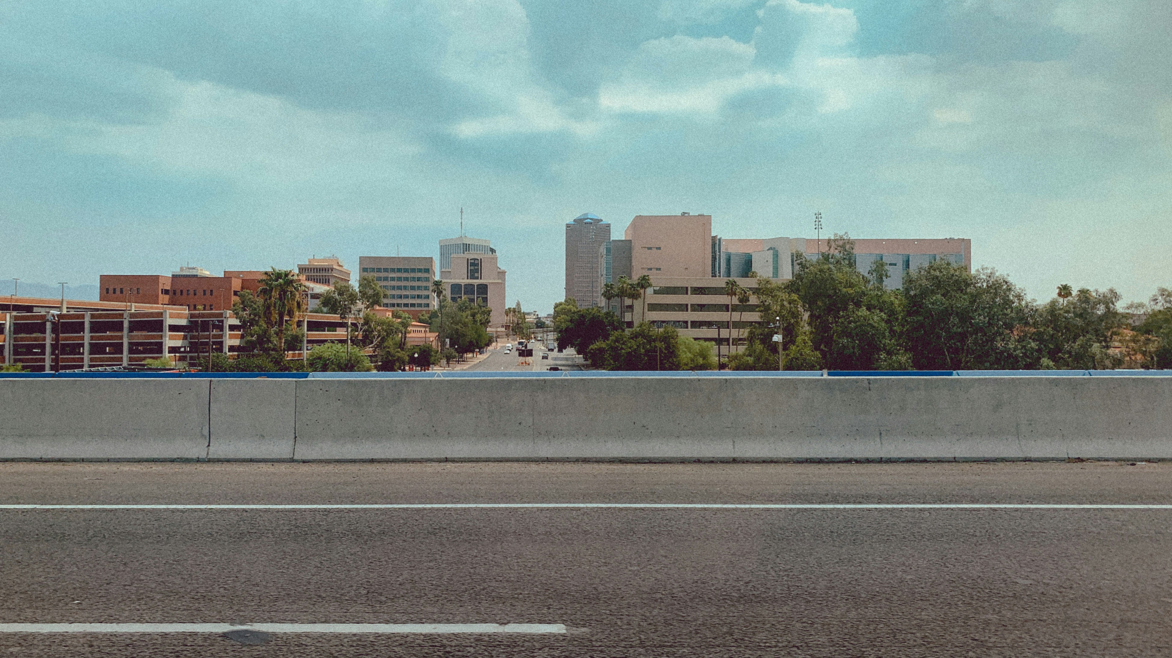 city buildings under blue sky during daytime