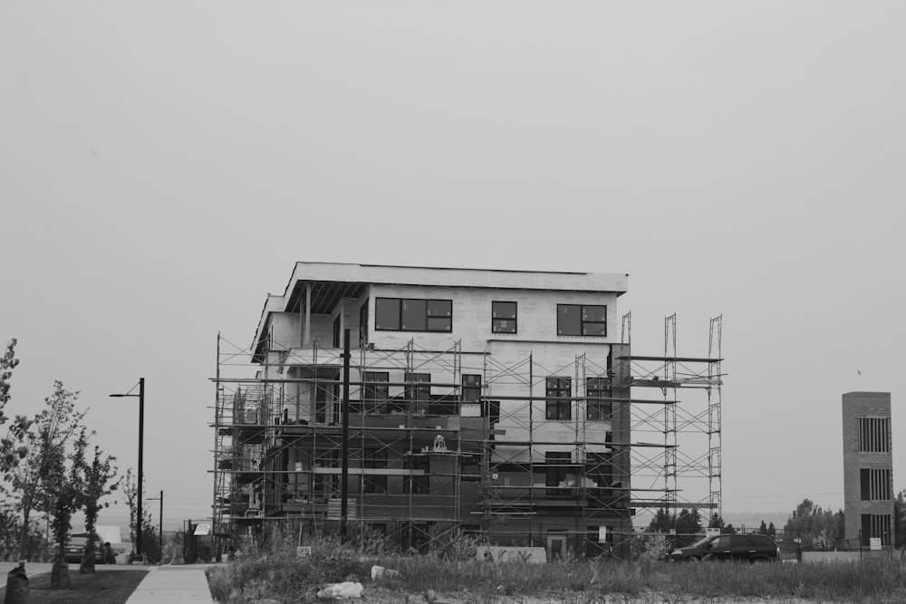 white concrete building on snow covered ground