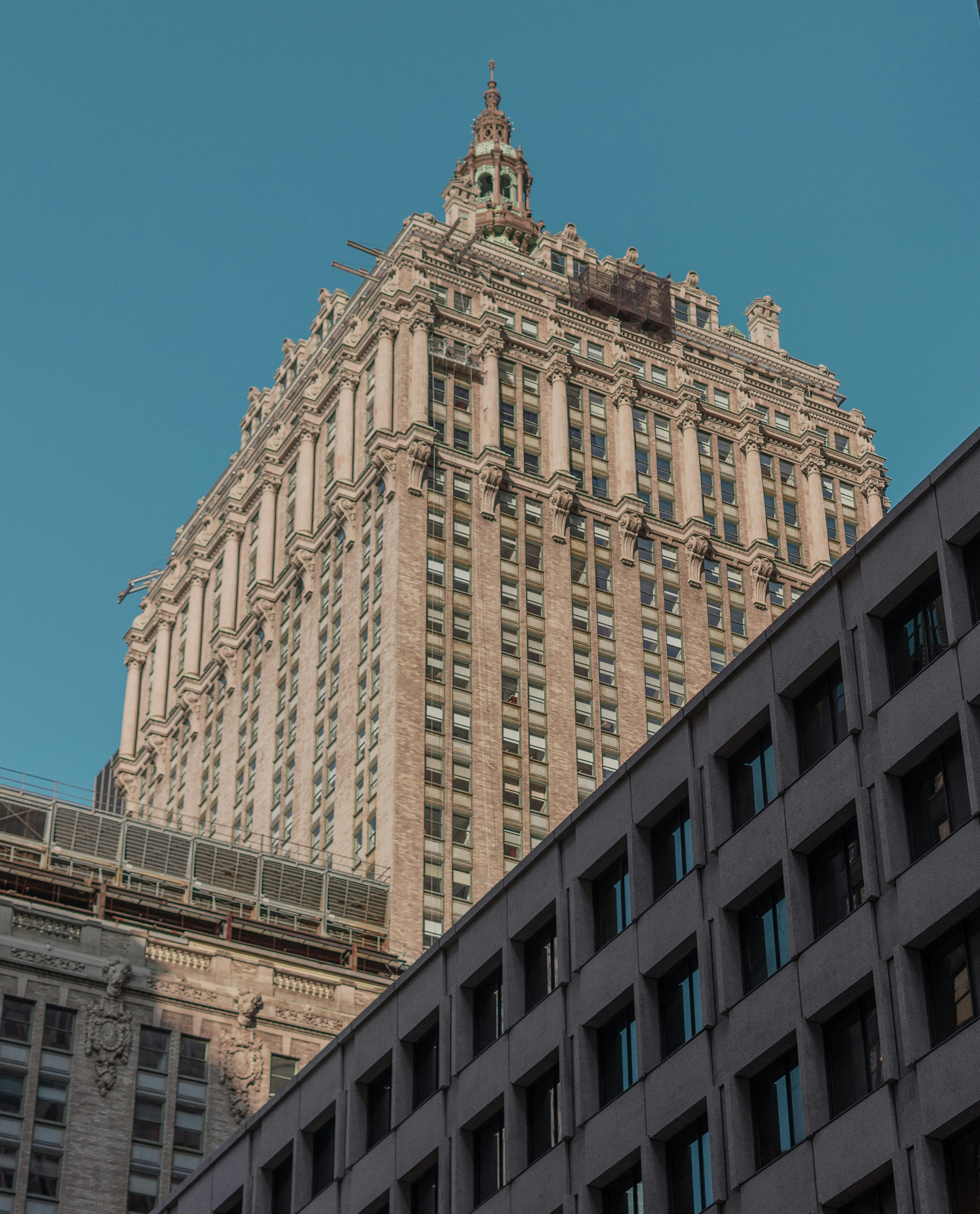 beige concrete building under blue sky during daytime
