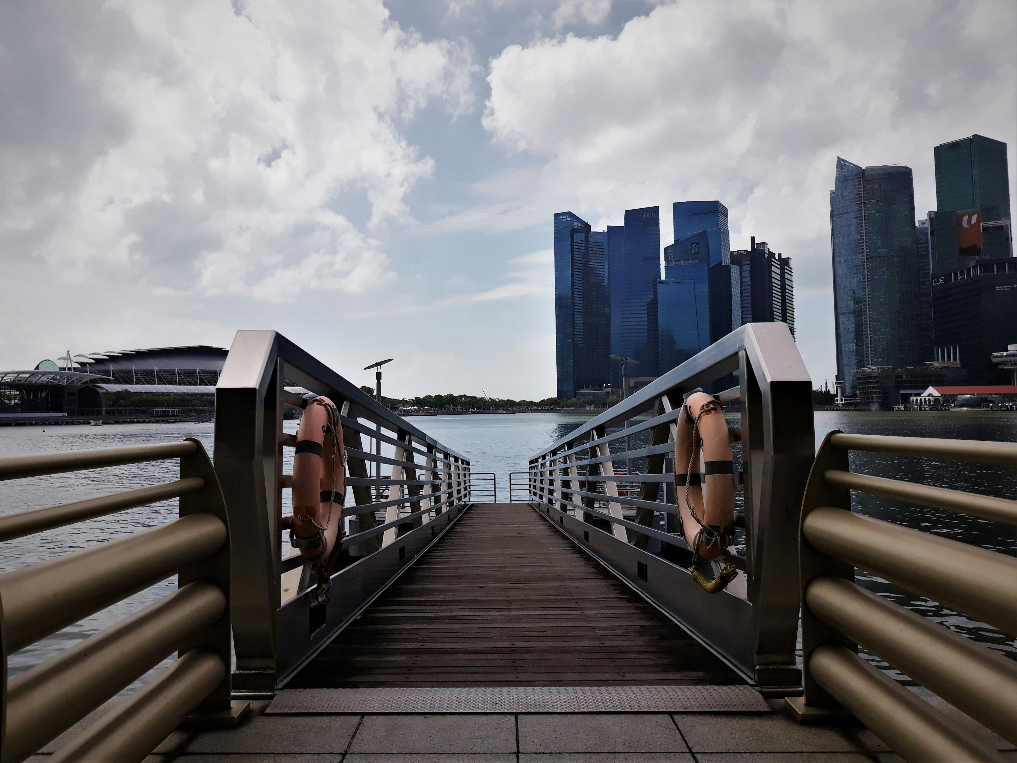 people walking on wooden dock during daytime