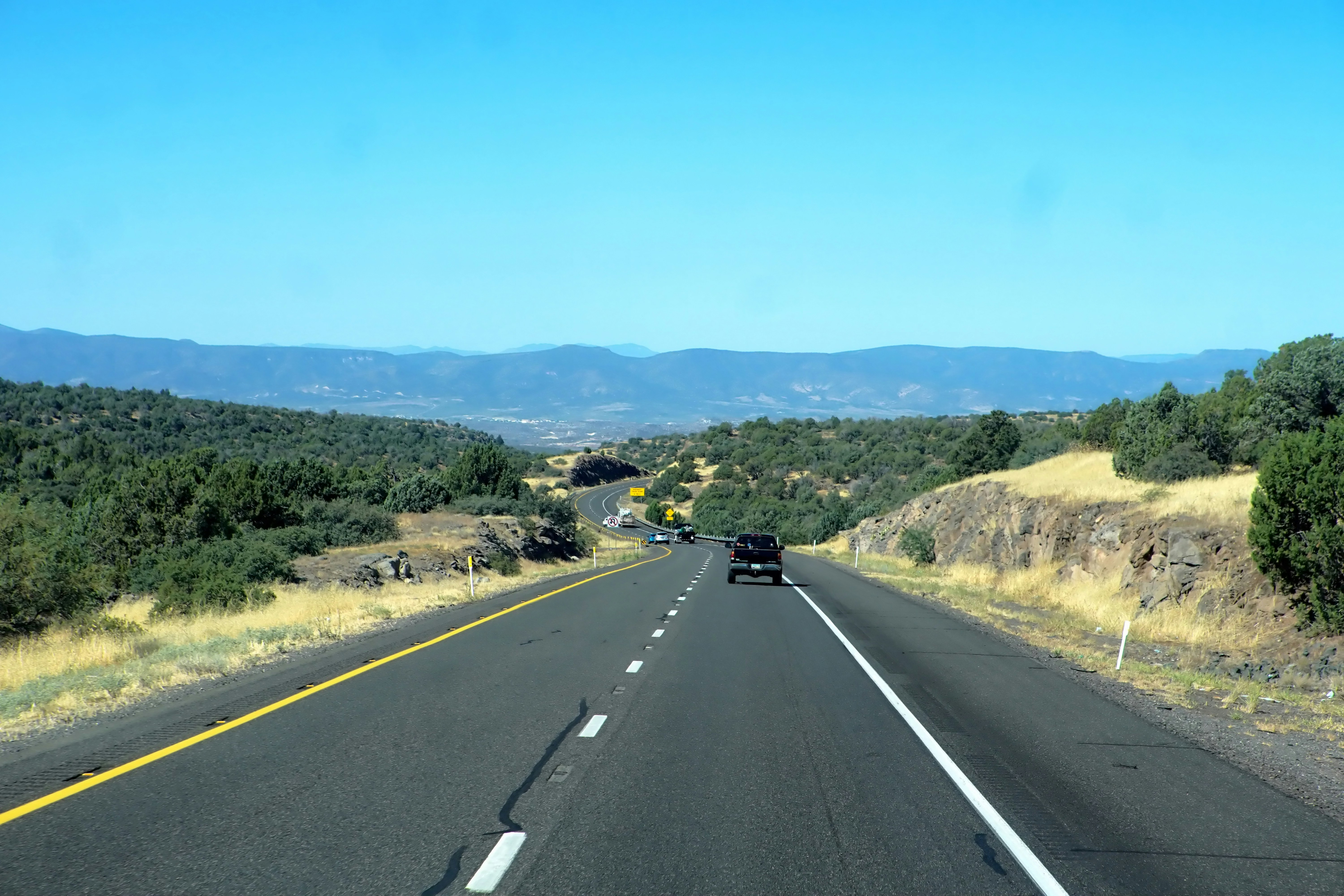 black car on road during daytime