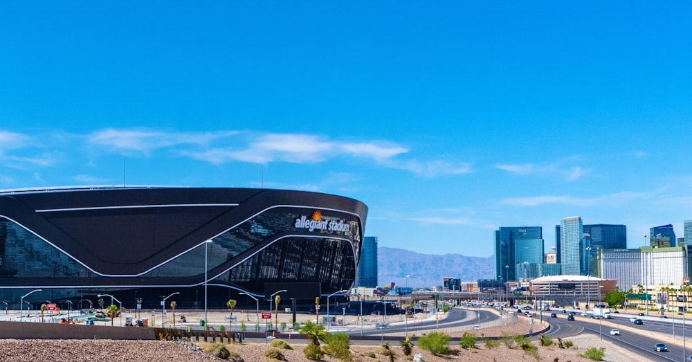 blue and white stadium under blue sky during daytime