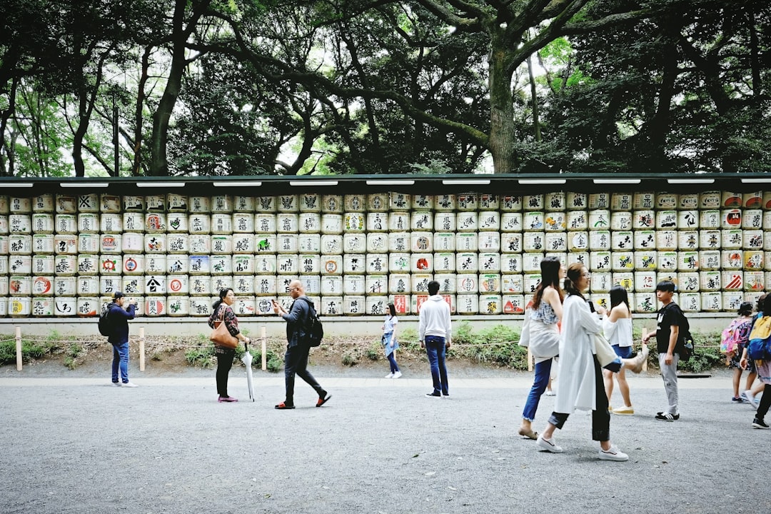 people walking on street near building during daytime