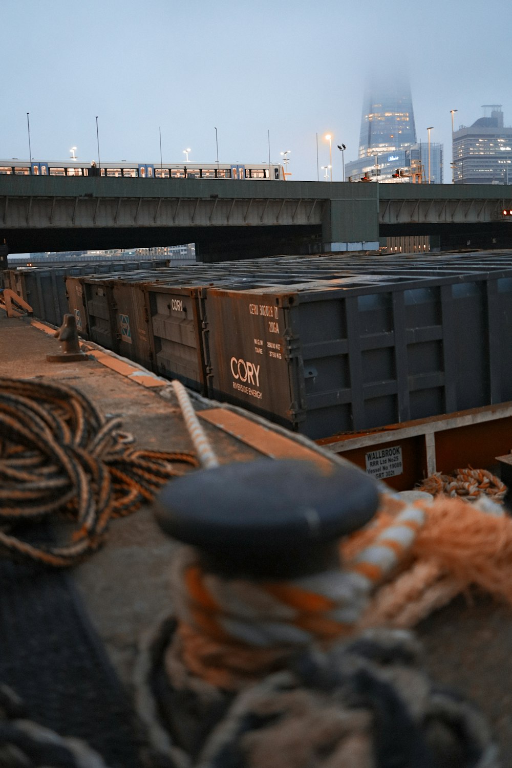 black and brown metal container on brown wooden table