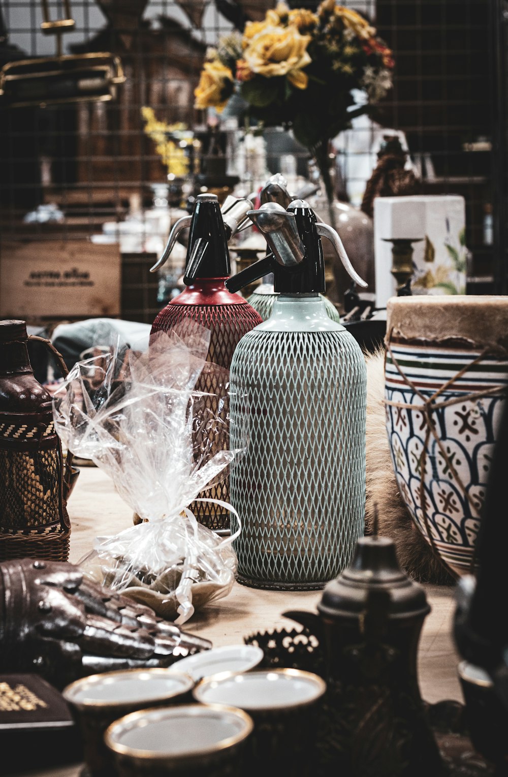 black and brown bottle beside clear plastic pack