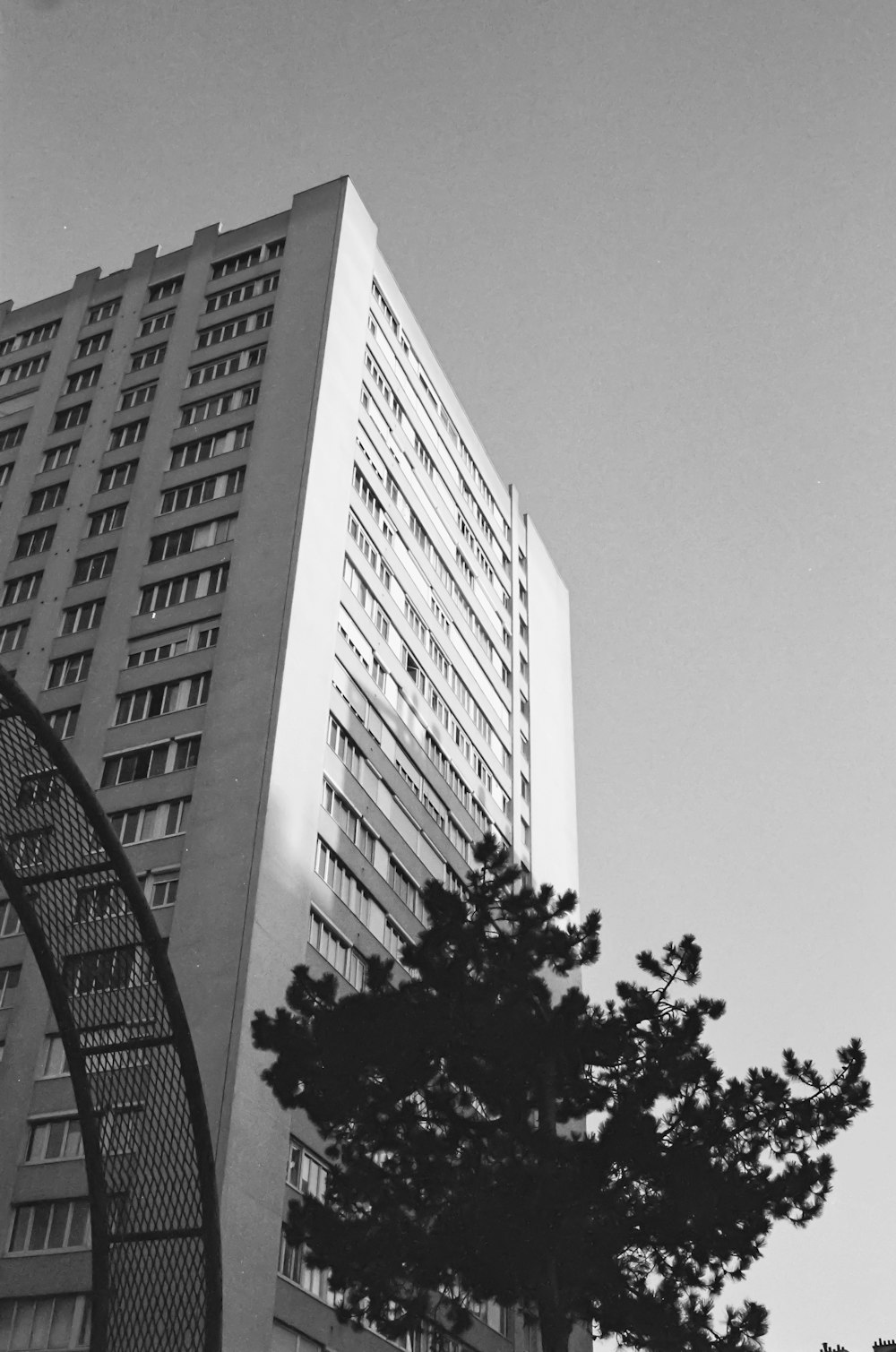 grayscale photo of high rise building