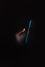 A comforting night-time digital chat interface glowing softly on a smartphone screen.