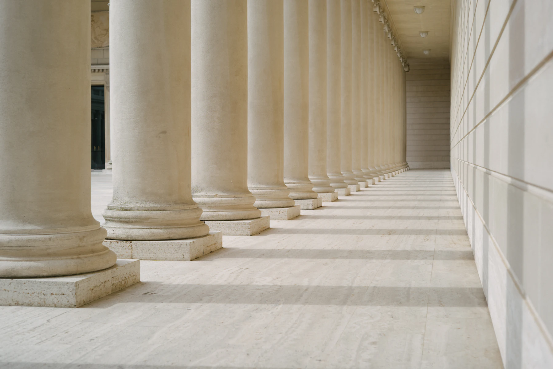 A long row of white stone columns