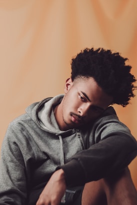 man in gray hoodie jacket