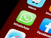 smartphone screen showing icons with logo guessing game