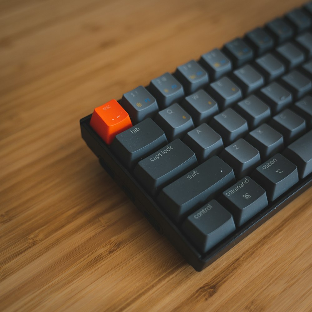 black and orange computer keyboard