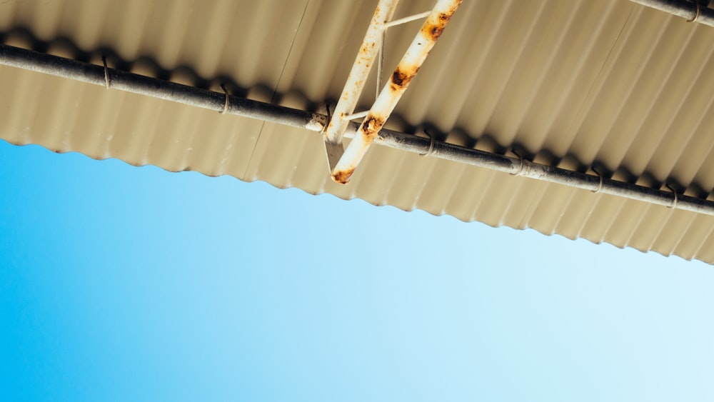 white steel frame under blue sky during daytime