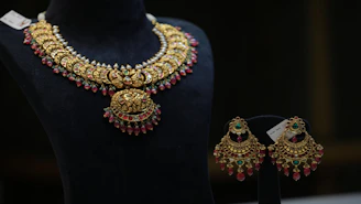 gold and red beaded necklace