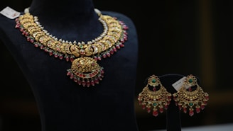 gold and red beaded necklace