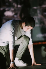 An athlete wearing xeontune gear, preparing mentally before a competition.