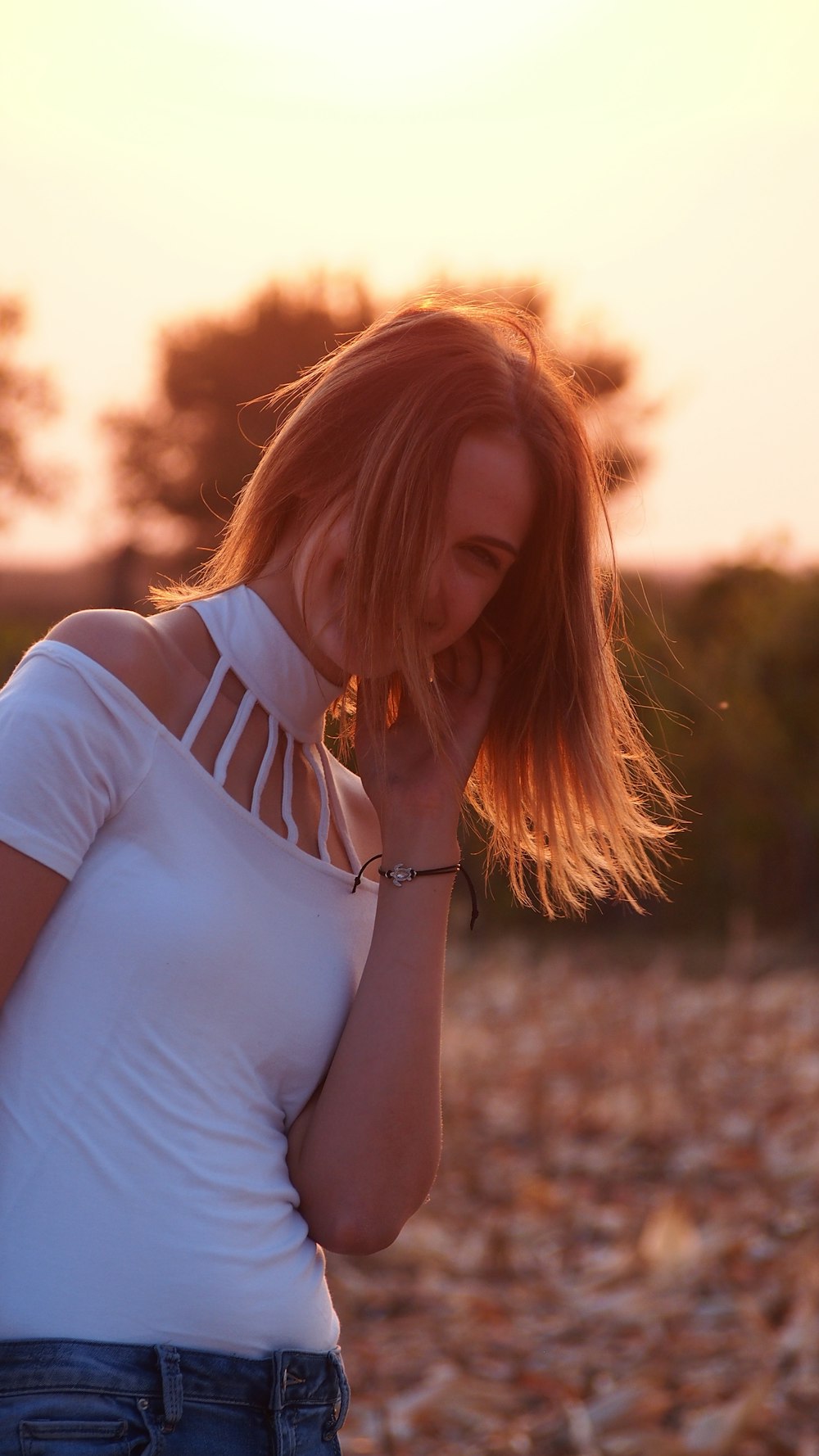 woman in white and black stripe shirt