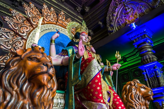 gold and red hindu deity statue in Mumbai India