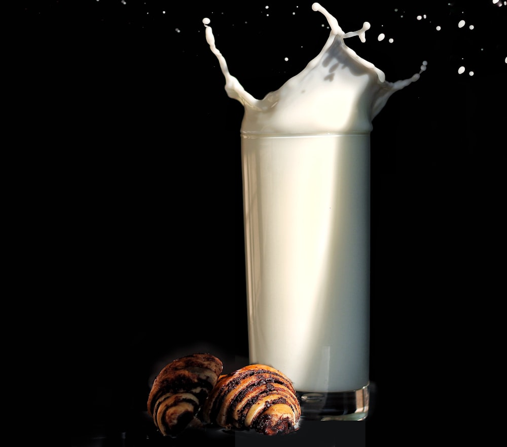 milk in clear drinking glass