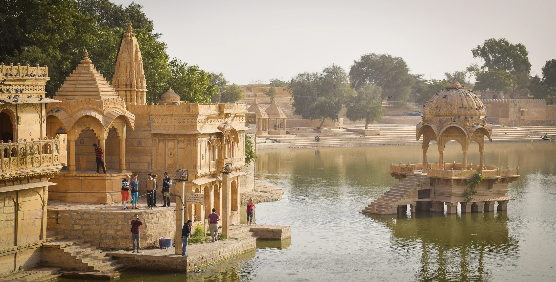 Sandstone cenotaphs standing in the water of Gadisar Lake, Jaisalmer