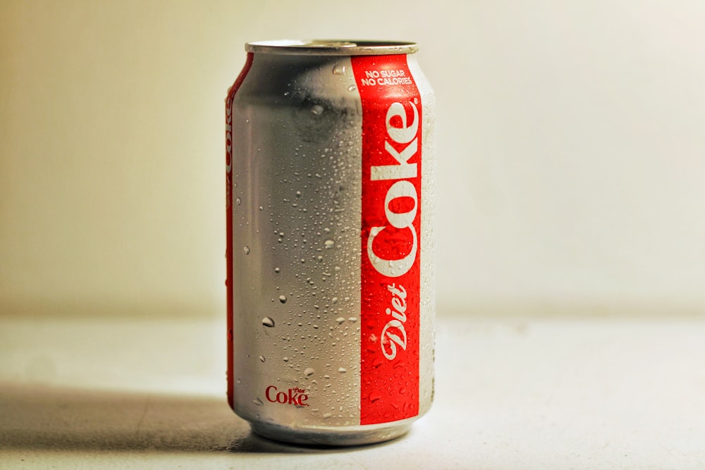 diet coke can on white table