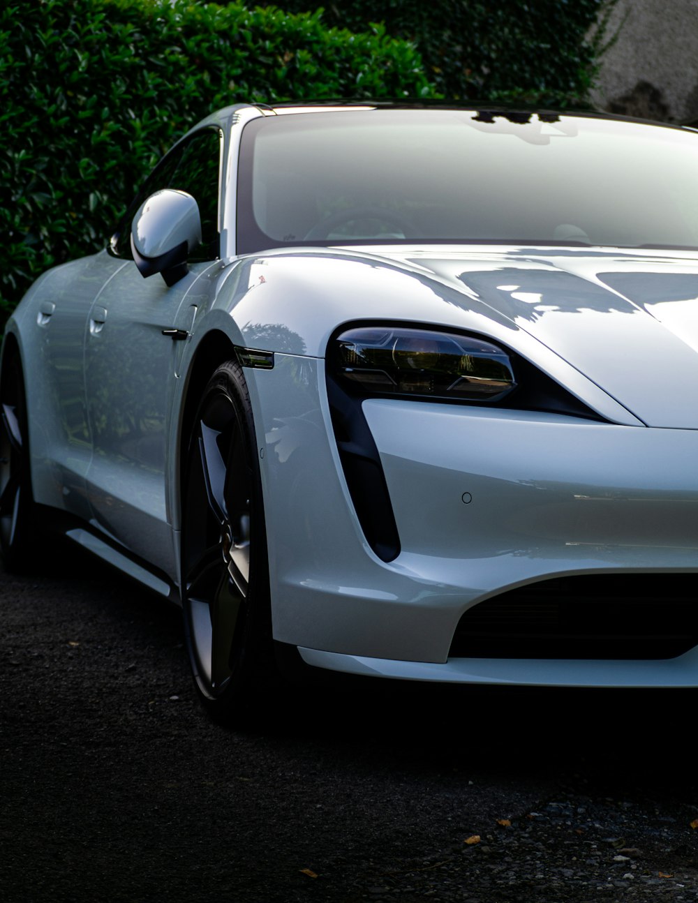 white porsche 911 on road during daytime