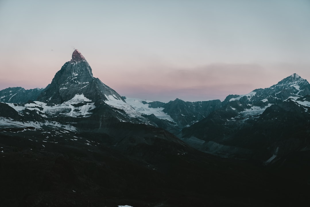 snow covered mountain during daytime