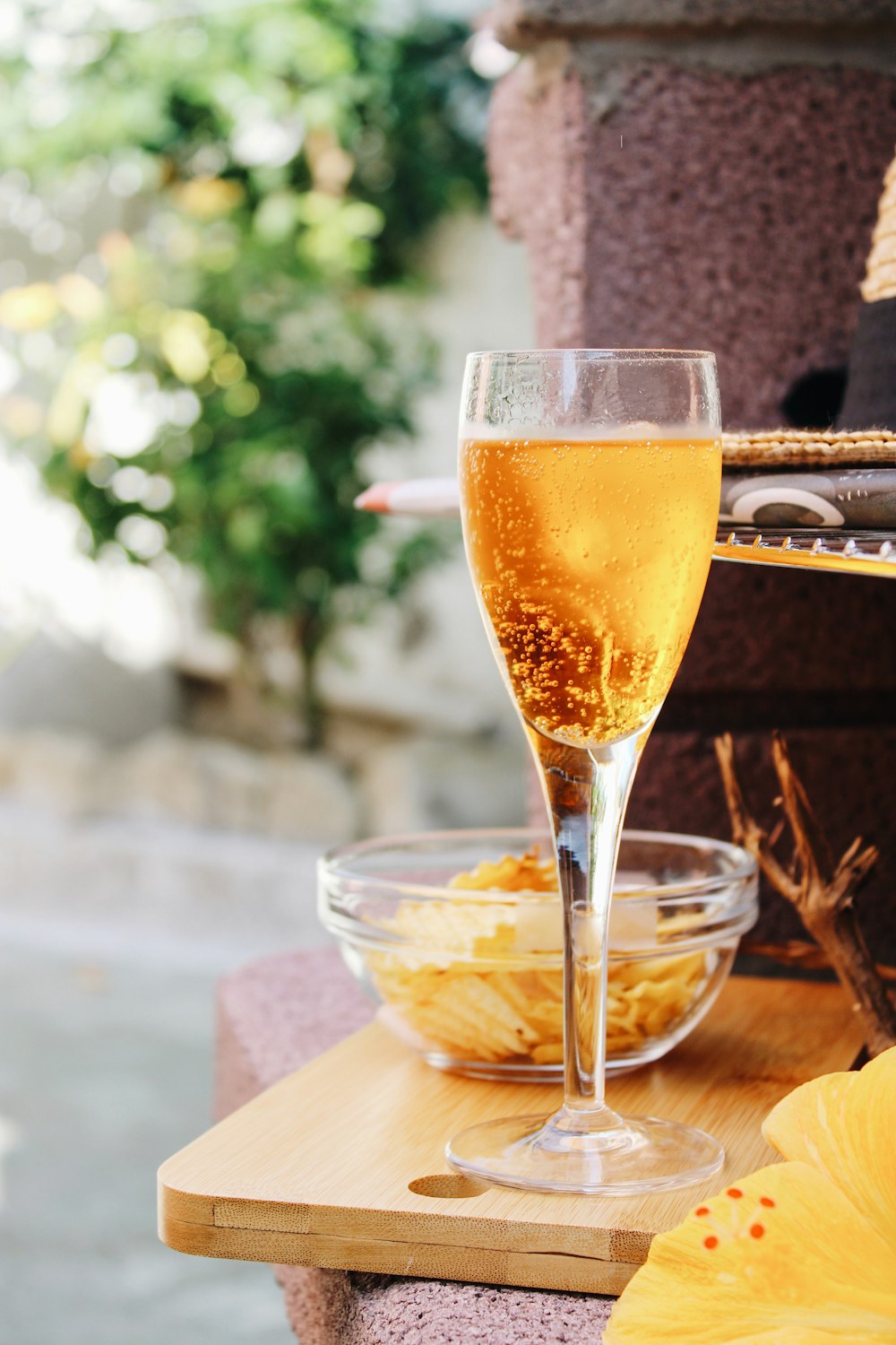 clear drinking glass with yellow liquid