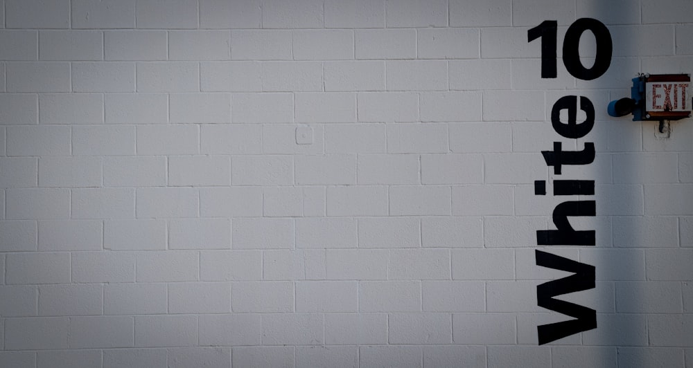 white wall with white ceiling