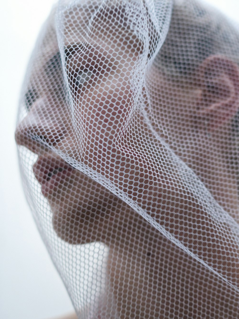 a woman with a veil on her head