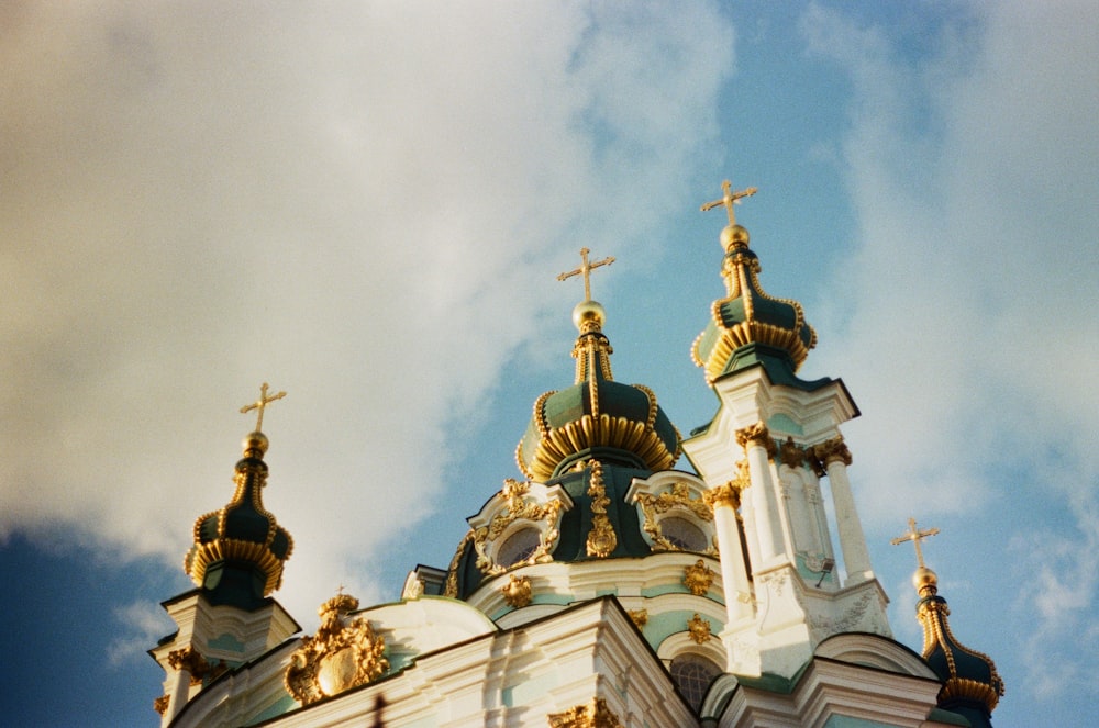 gold and white concrete church