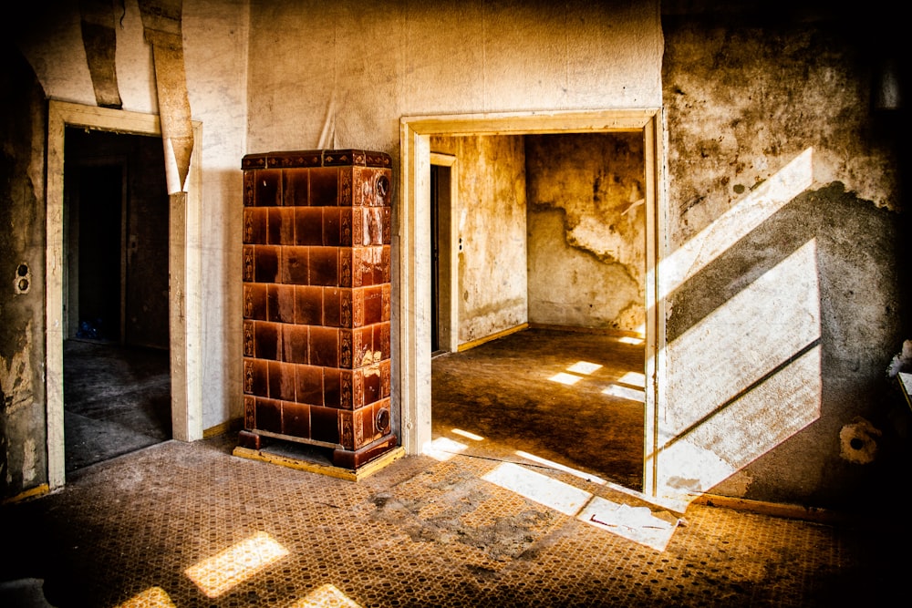 brown wooden door on gray concrete wall