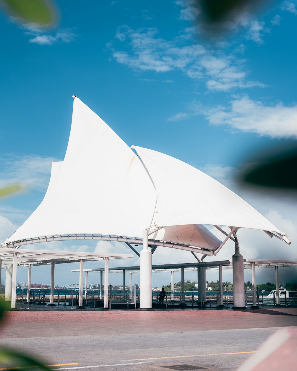 white concrete building under blue sky during daytime